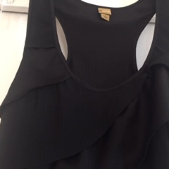 Small Sleeve Less Ruffle Shirt - Picture 1 of 4